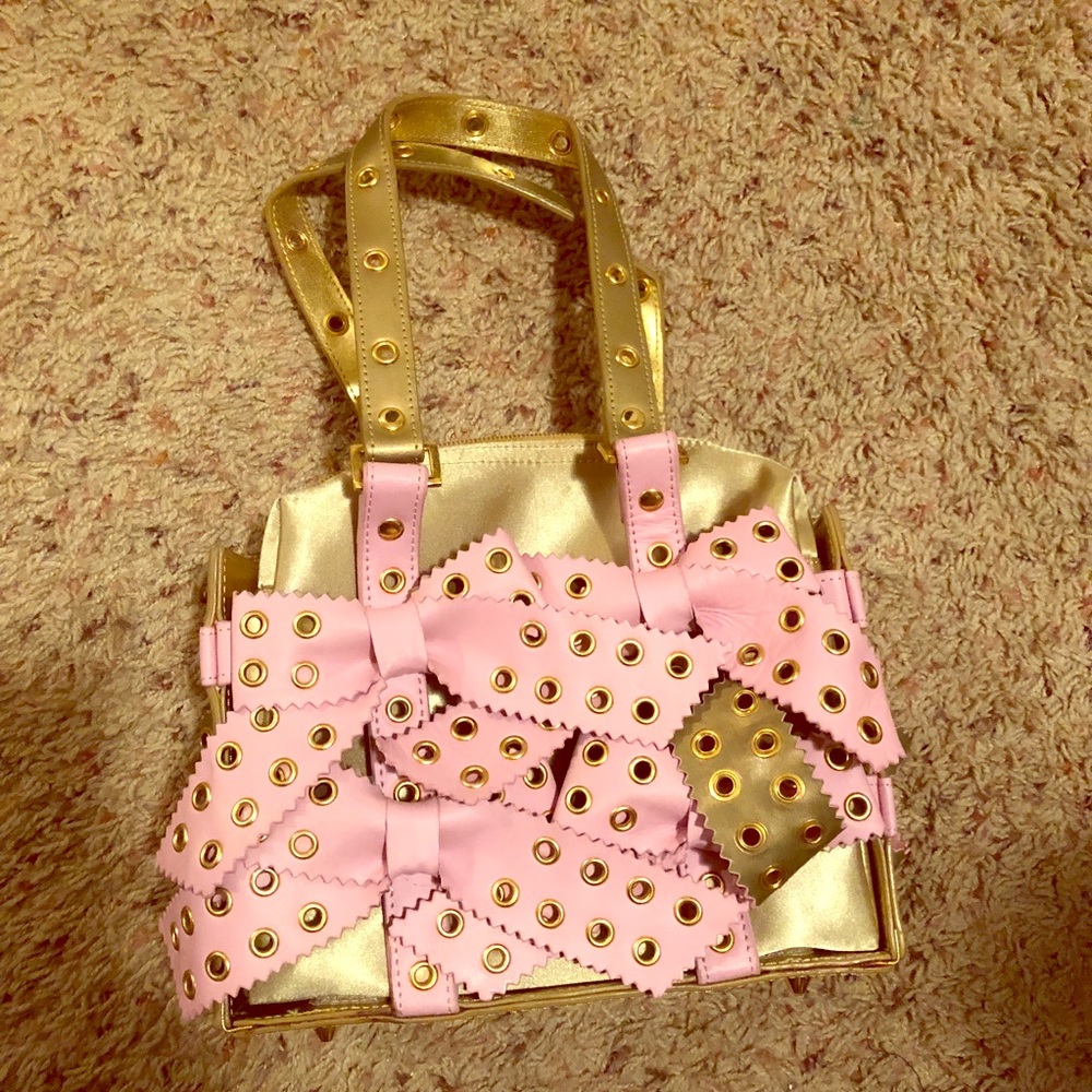 Beautiful olive green and bubble gum pink bag.